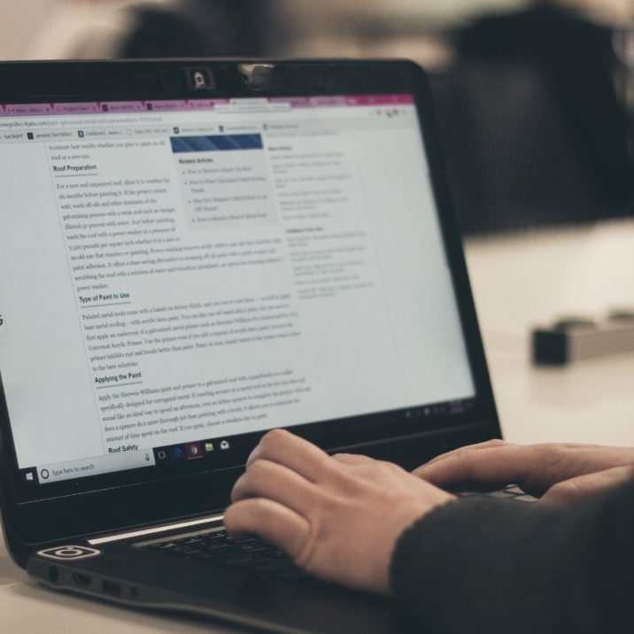 Someone reading an article they would reference if they were doing research on the topic